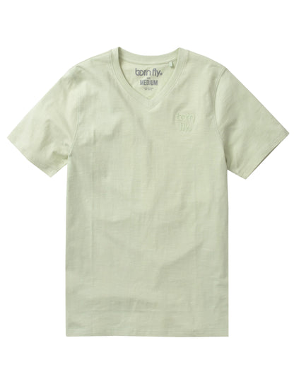 Born fly v neck tee soft pale green short sleeve with subtle embroidered logo on left chest and brand tag inside collar