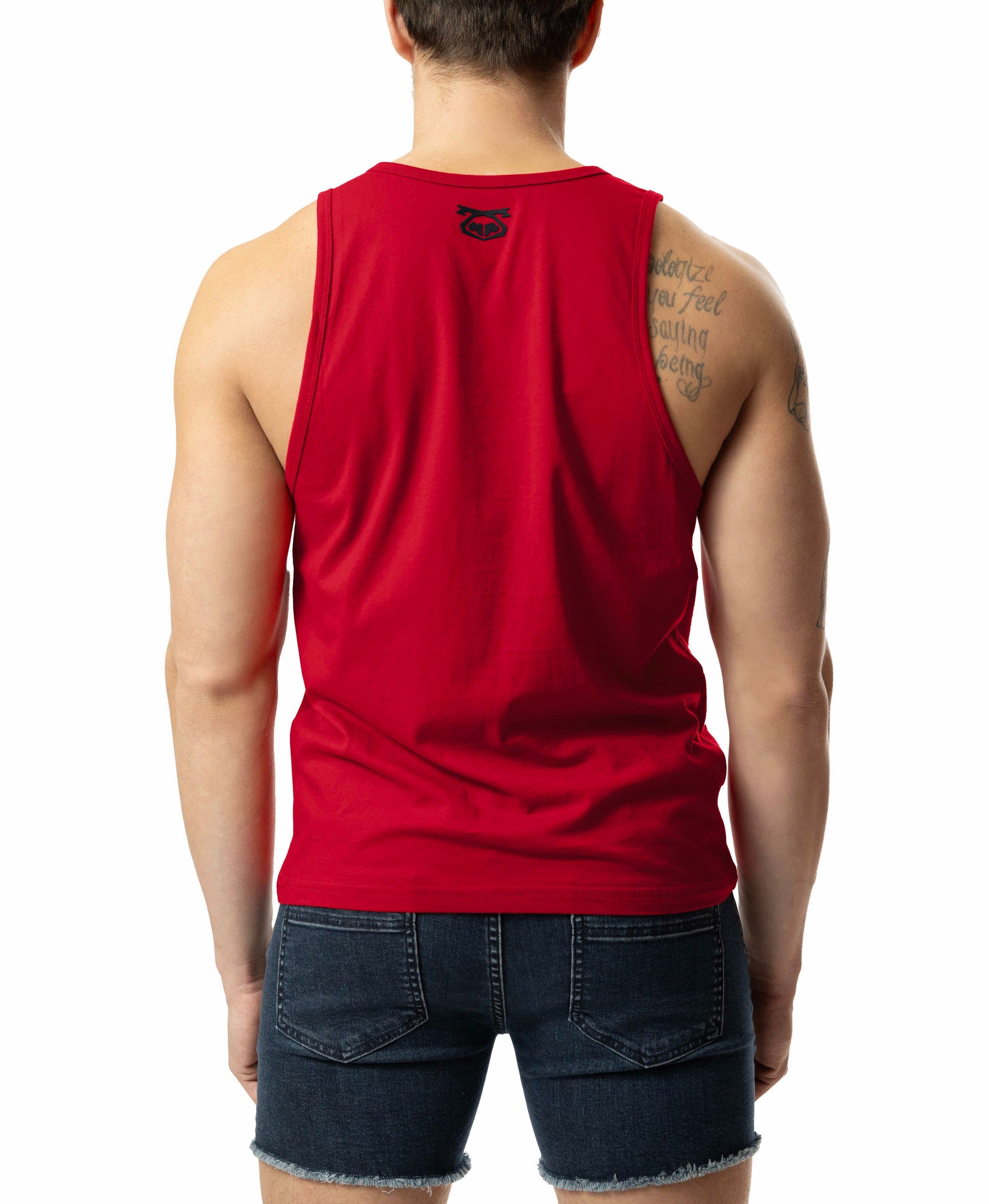 Back side of a red sleeveless brandmark tank top with a small black logo on the upper back