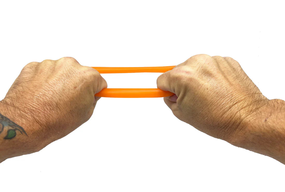 Bright orange BUFU ring elastic band made of stretchy material being stretched between two hands