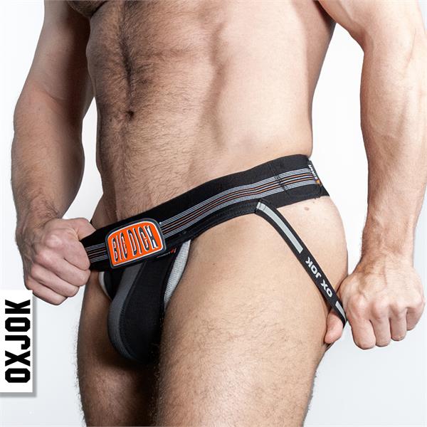 Black oxjok bulger jockstrap briefs with big dick branding and orange gray striped accents front view
