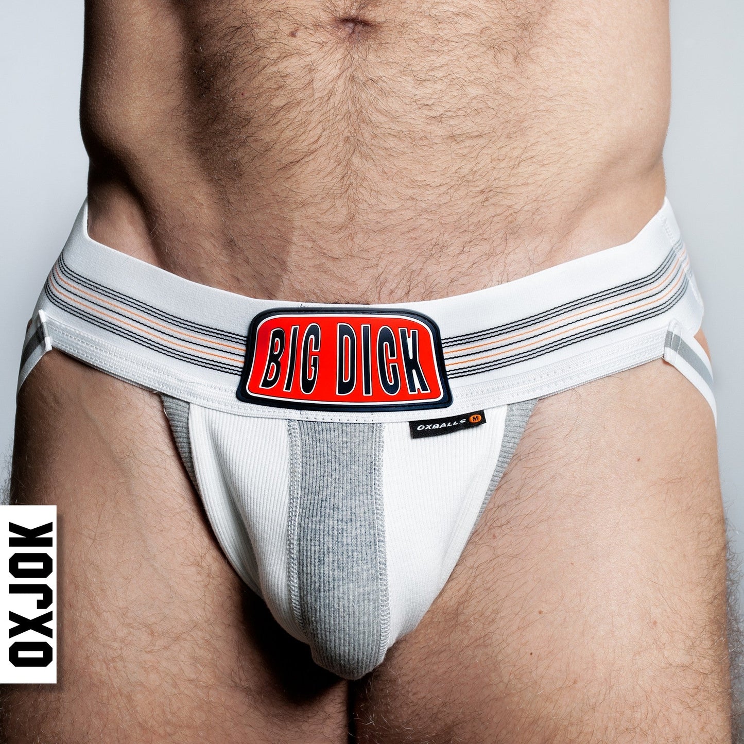 Bulger jockstrap white and gray athletic brief with bold red big dick logo patch on the front