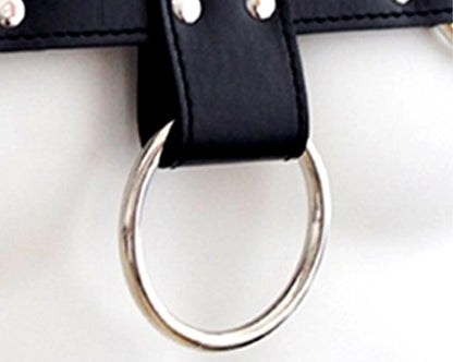 Black leather bulldog harness strap with silver toned metal ring and rivets for durable dog control