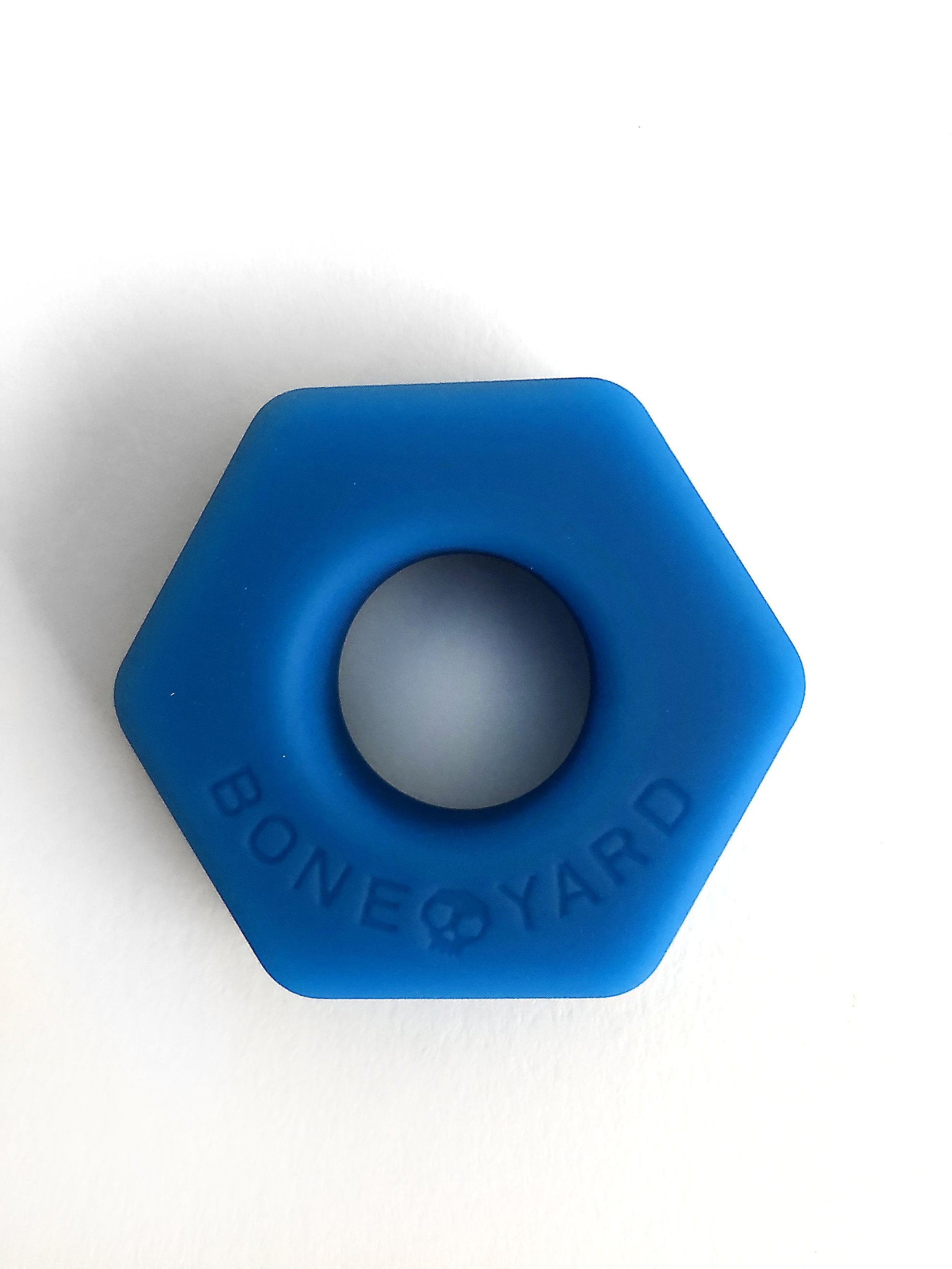 Blue hexagonal silicone ring with bone yard engraving from bust a nut collection