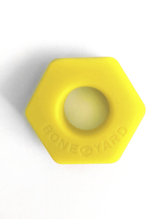 Bright yellow hexagonal silicone ring bust a nut with bone yard embossed for grip and style