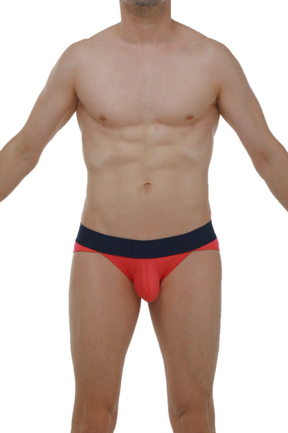 Snug form-fitting red and navy blue briefs featuring a bikini mega bulge design in fuchsia color