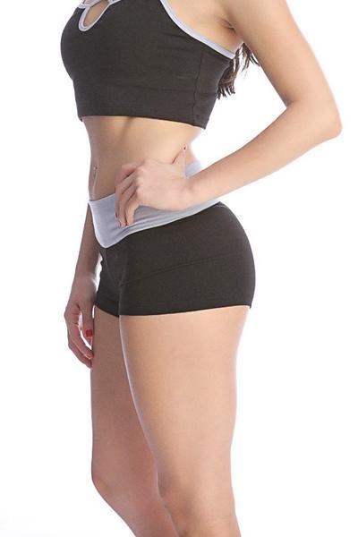 Black and gray athletic crop top with cutout neckline made from breathable fabric for activewear titled bumble short