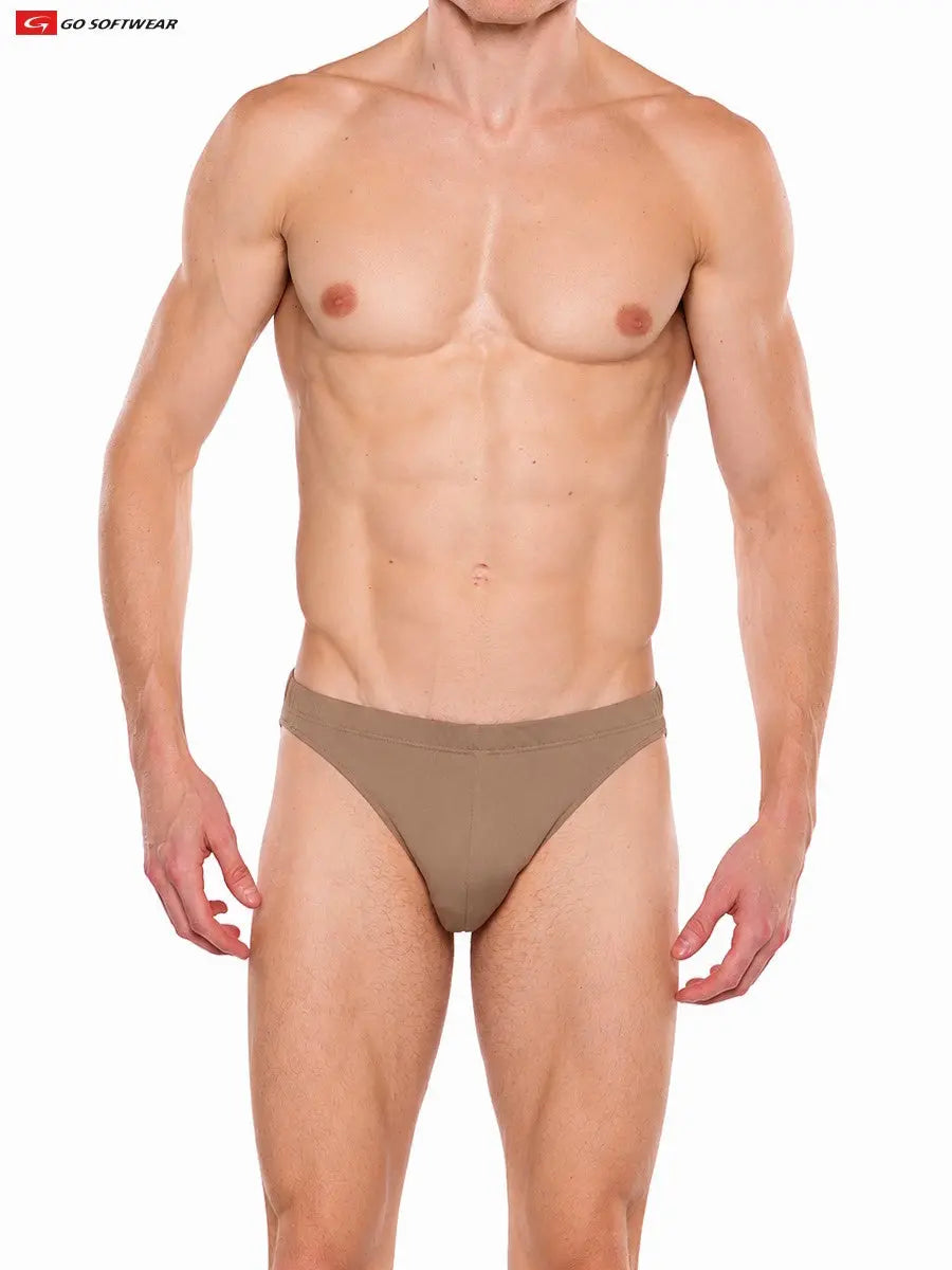 Model wearing brown suede men's contour brief by Go Softwear featuring a snug fit and minimal coverage