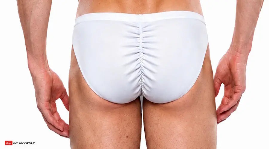White men's contour brief with gathered back detail shown on a model from behind by Go Softwear