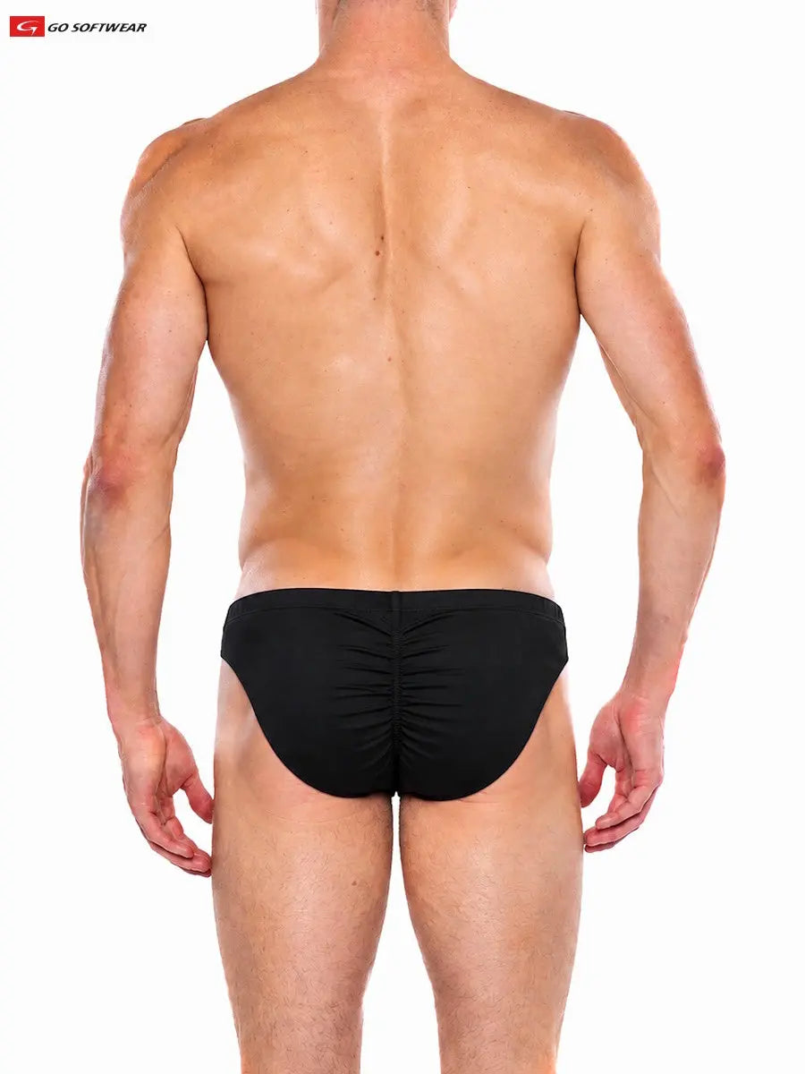 Black men's contour brief by Go Softwear featuring a gathered back design shown on a model from behind