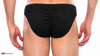 Black contour brief with gathered back detail shown on a model from behind by Go Softwear