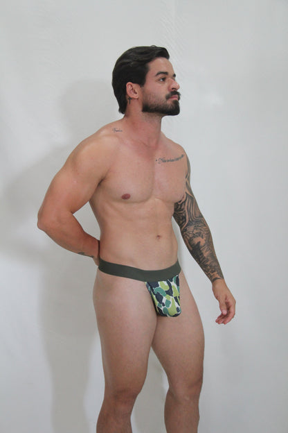 Green and white camouflage thong with solid dark green waistband made of soft breathable fabric for everyday wear