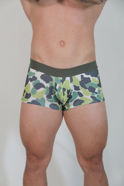 Green and black camouflage trunk briefs with solid olive green waistband designed for comfortable everyday wear