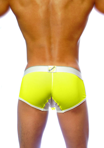 Bright neon yellow groovin underwear ventilated cup boxer with white trim mesh back panel and brand tag visible from back