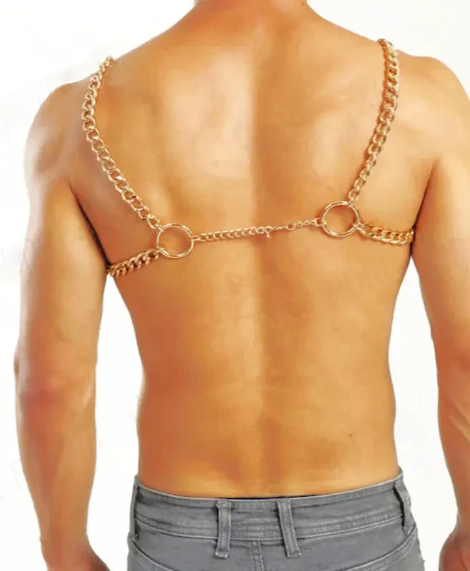 Gold-colored chain harness with two large circular rings and central link worn across the back side