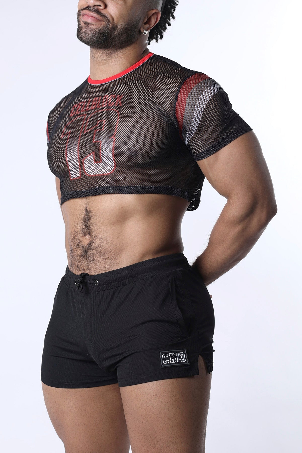 Chain reaction mesh crop top black mesh with red and gray accents and a bold 13 graphic on the front