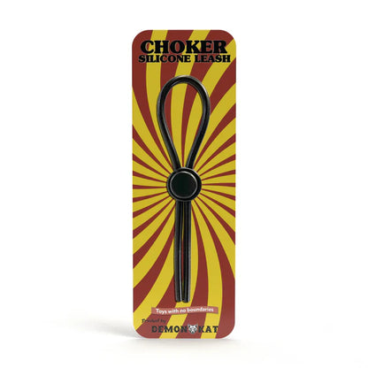 Black silicone choker leash with central circular ring packaged in red and yellow sunburst design