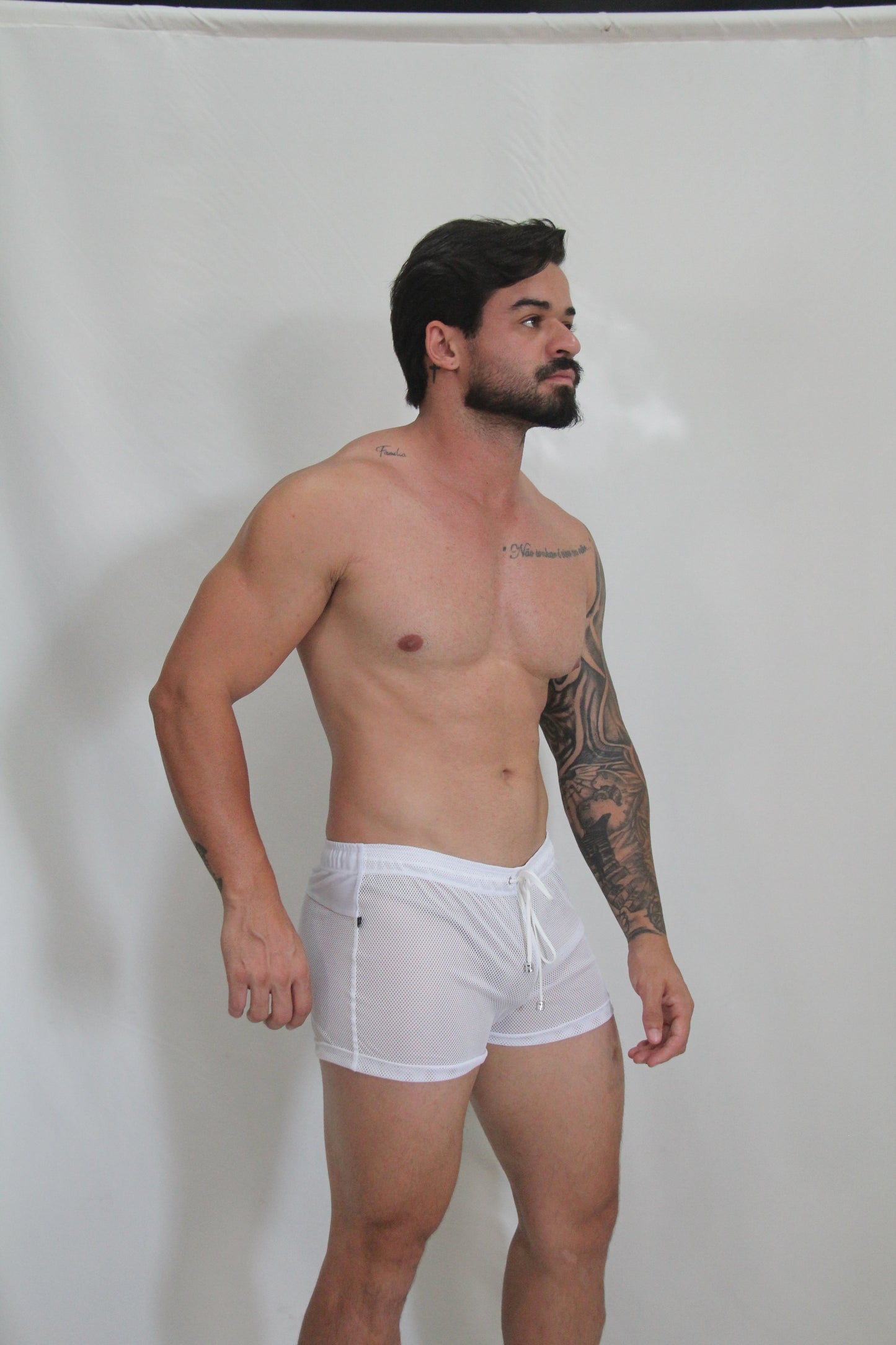White circuit mesh shorts with a drawstring waistband made of breathable athletic mesh fabric available in 4 colors