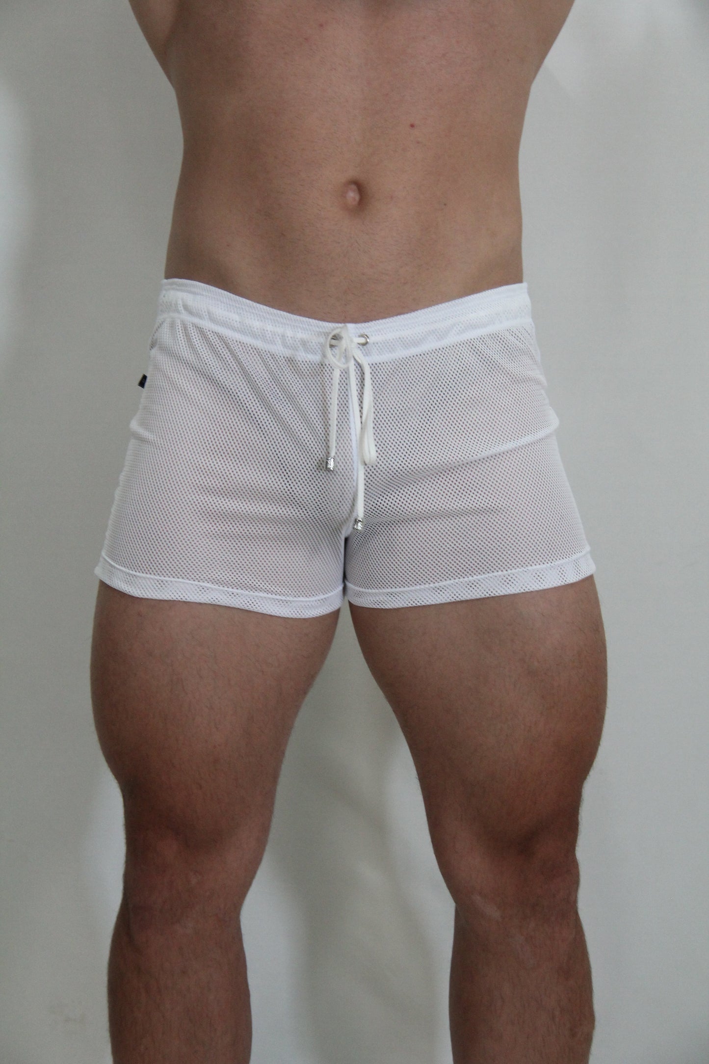 White mesh swim trunks with a drawstring waistband from the Circuit Mesh Short collection in four colors available