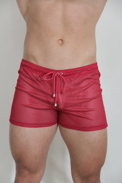 Red mesh swim trunks with matching drawstring and silver metal aglets from circuit mesh short collection in red