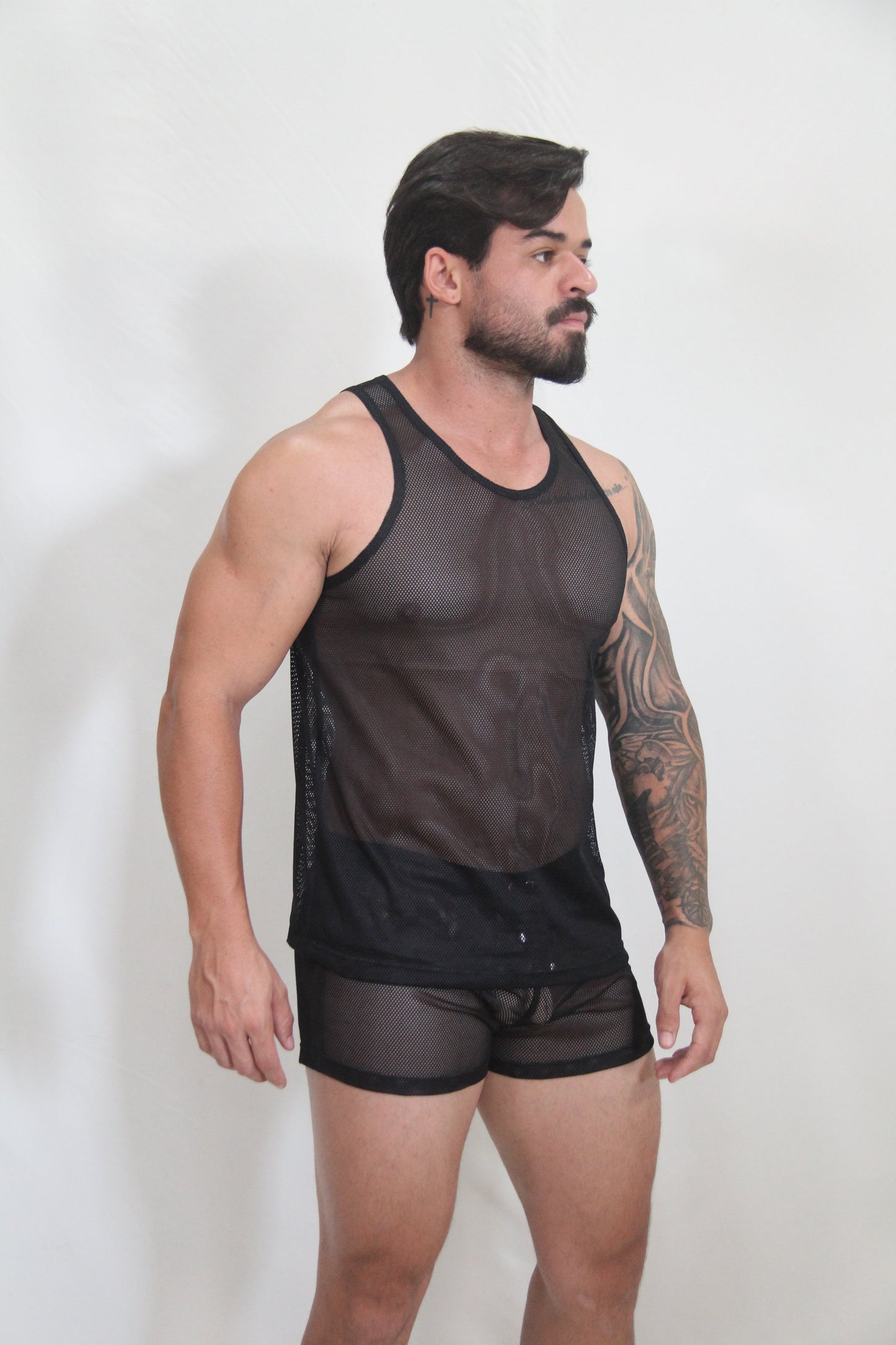 Black mesh tank top with solid black bottom hem and side panels from circuit mesh tanks 4 colors available collection