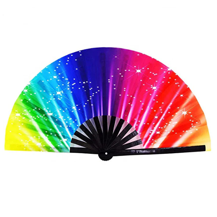 A vibrant rainbow-colored folding fan with sparkling star pattern and black ribbed handle from CLACK FANS