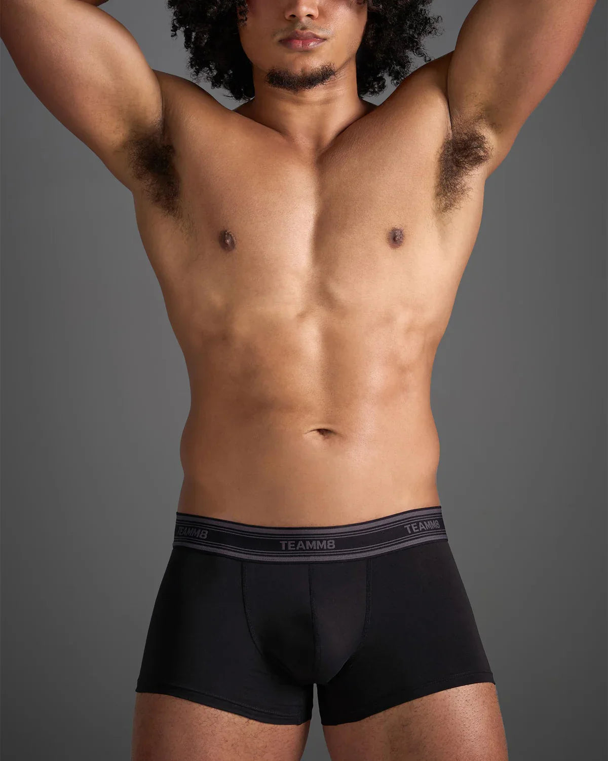 Black classic cotton trunk boxer briefs with gray elastic waistband featuring white brand name lettering