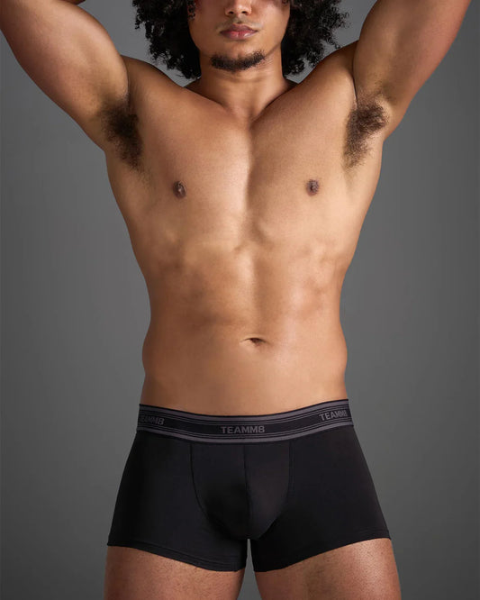 Black classic cotton trunk boxer briefs with gray elastic waistband featuring white brand name lettering