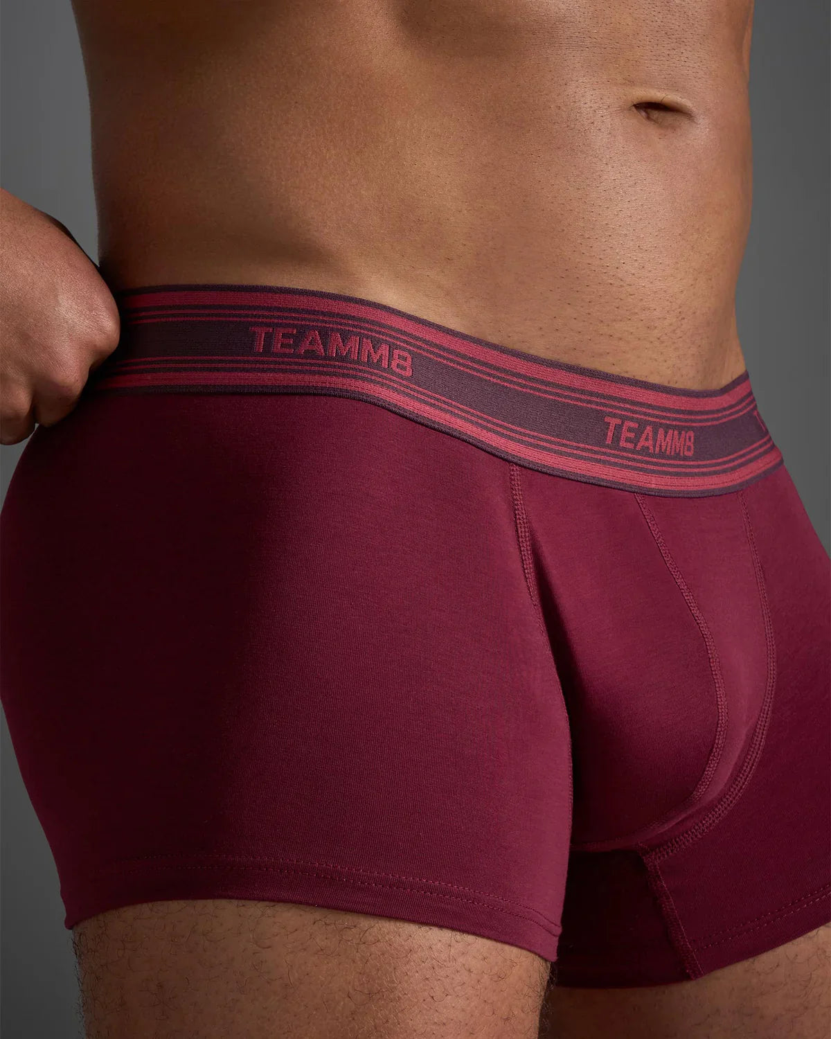 Classic cotton trunk maroon boxer briefs with pink and dark gray elastic waistband featuring brand name