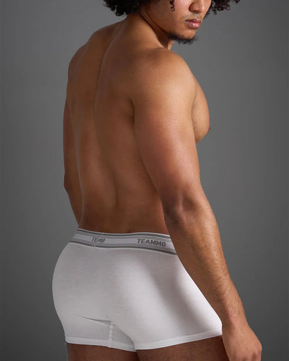 White classic cotton trunk boxer briefs with a gray elastic waistband featuring black brand name lettering