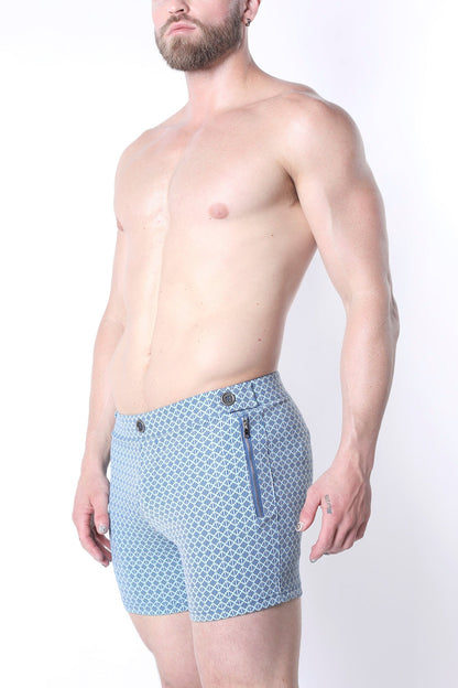 Light blue clemente swim short with subtle geometric pattern and matching zipper detail limited edition</user