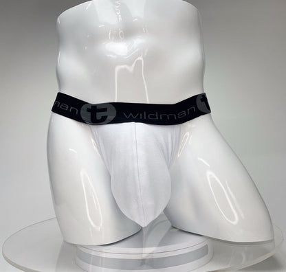White WildmanT jockstrap with a contoured big-boy pouch and a black branded elastic waistband on a white mannequin.