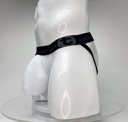 White jockstrap with a large pouch on a white mannequin, featuring a black branded waistband with a WildmanT logo.