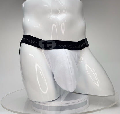 White WildmanT jockstrap with a large front pouch and a black branded elastic waistband on a white mannequin torso.