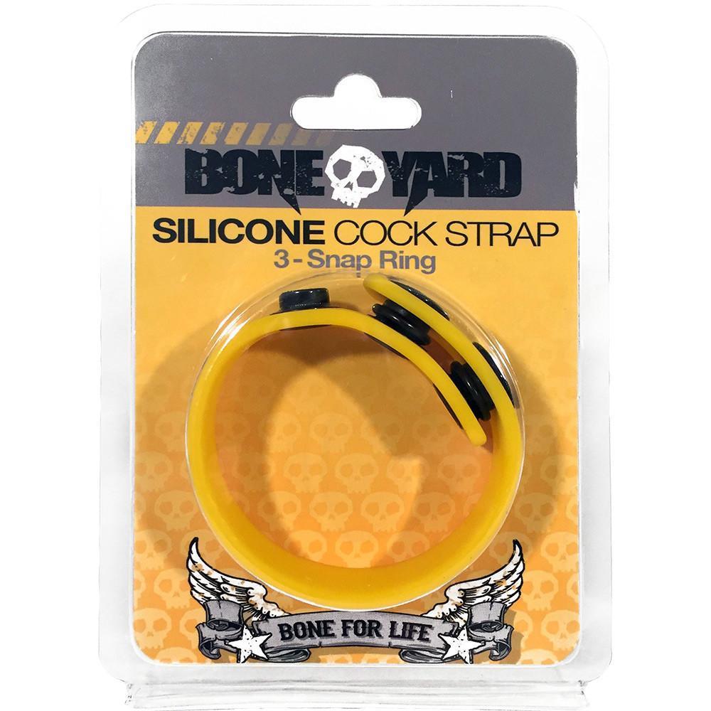 Yellow silicone cock strap with black snap rings from Bone Yard designed for secure and adjustable fit