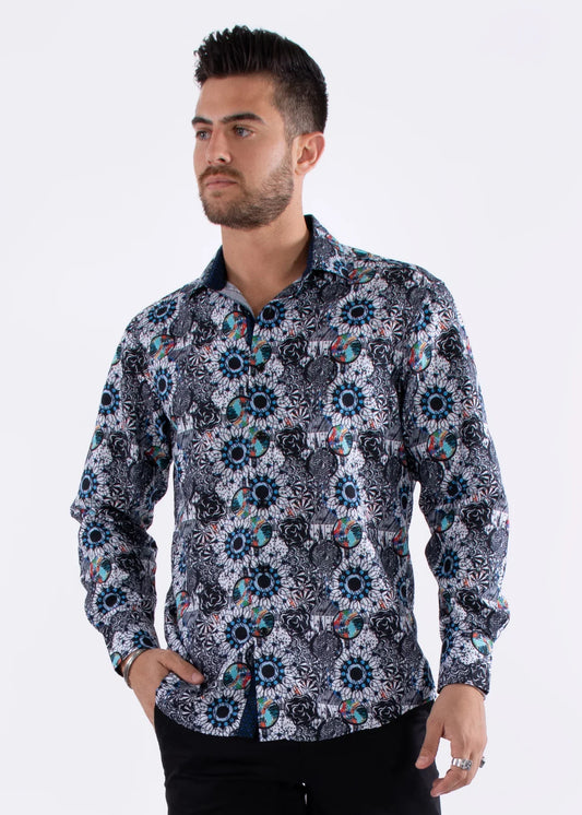A men’s long-sleeved button-up shirt with bold geometric and floral patterns in navy blue teal black white and pink