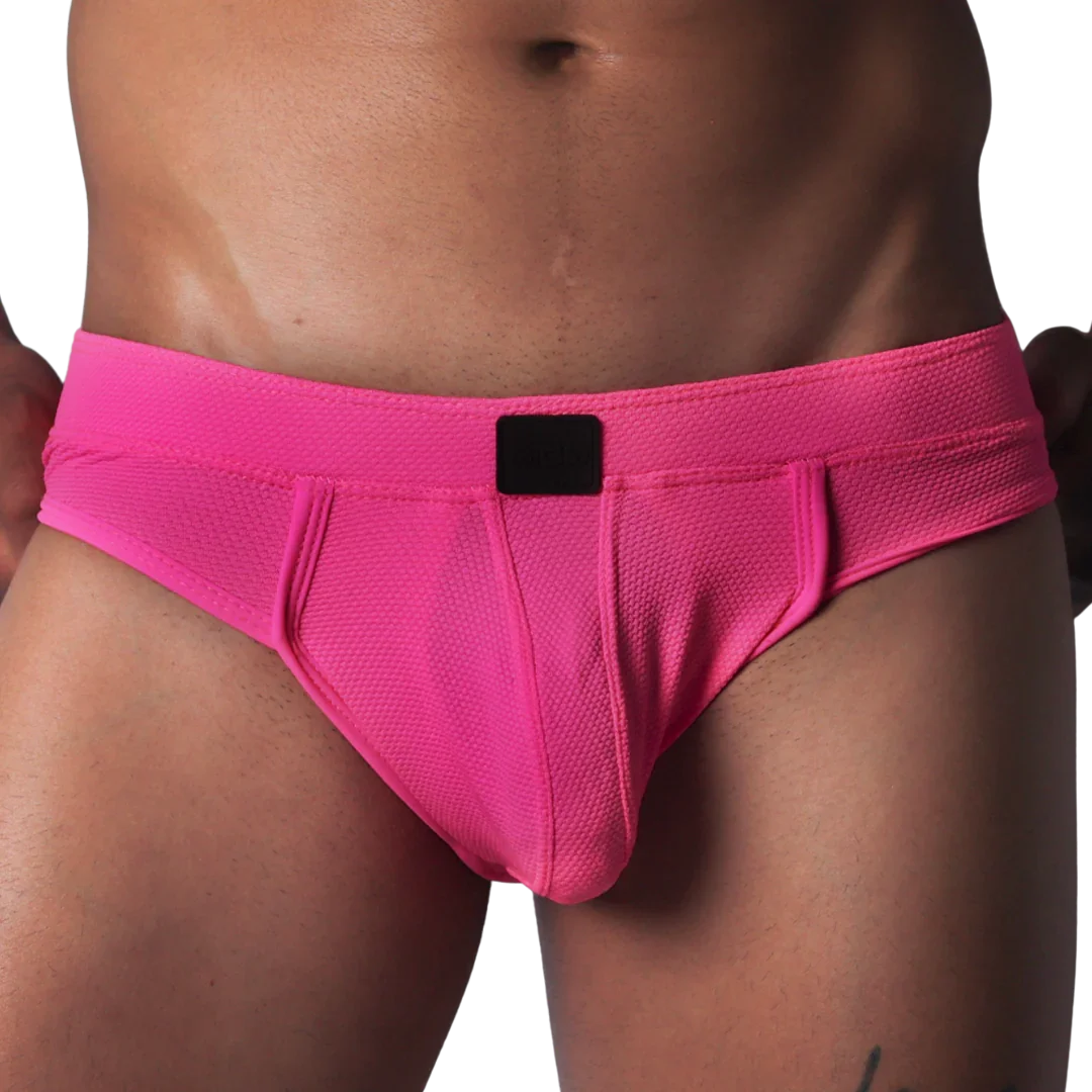 Fuchsia textured mesh jockstrap brief with a wide waistband and a central black logo patch.