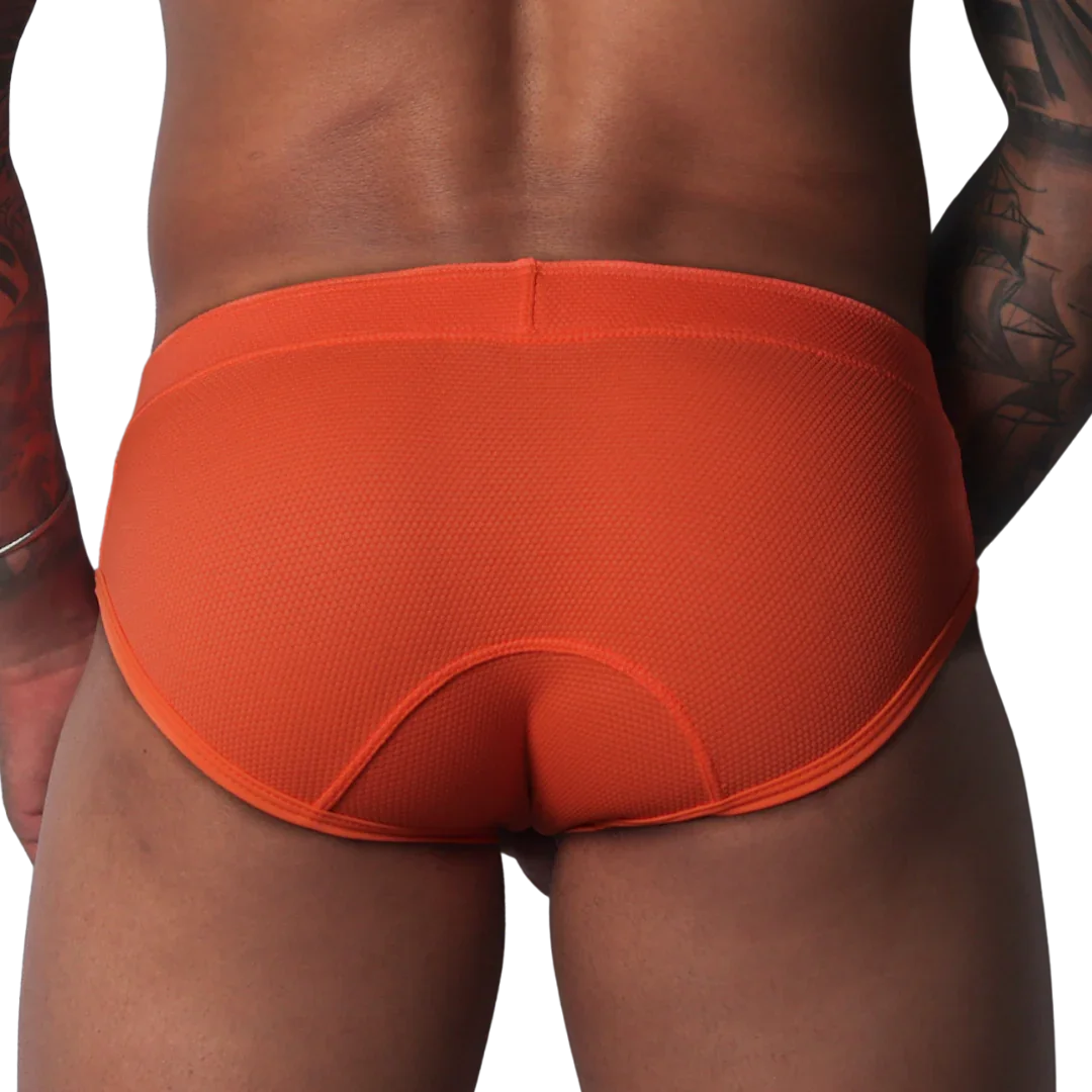 Bright orange, textured athletic brief with a wide waistband and contoured back panel seams.