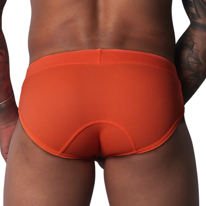 Bright orange, textured athletic brief with a wide waistband and contoured back panel seams.