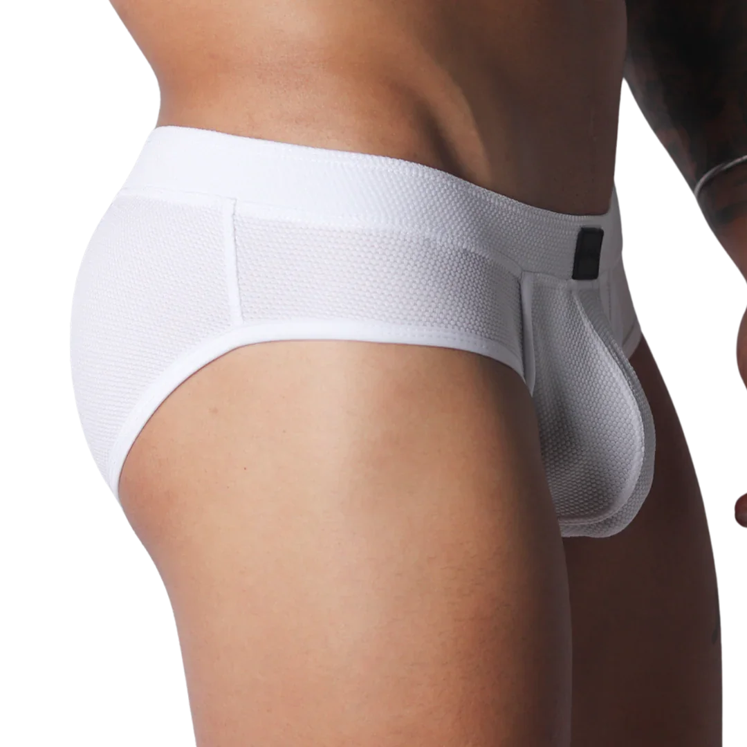 White athletic-style briefs made from textured, breathable mesh fabric with a thick waistband and contoured pouch.