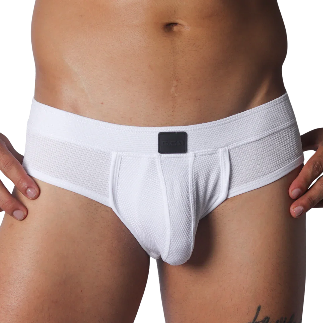 White textured mesh brief with a wide waistband and a small black Gigo logo patch at the front center.
