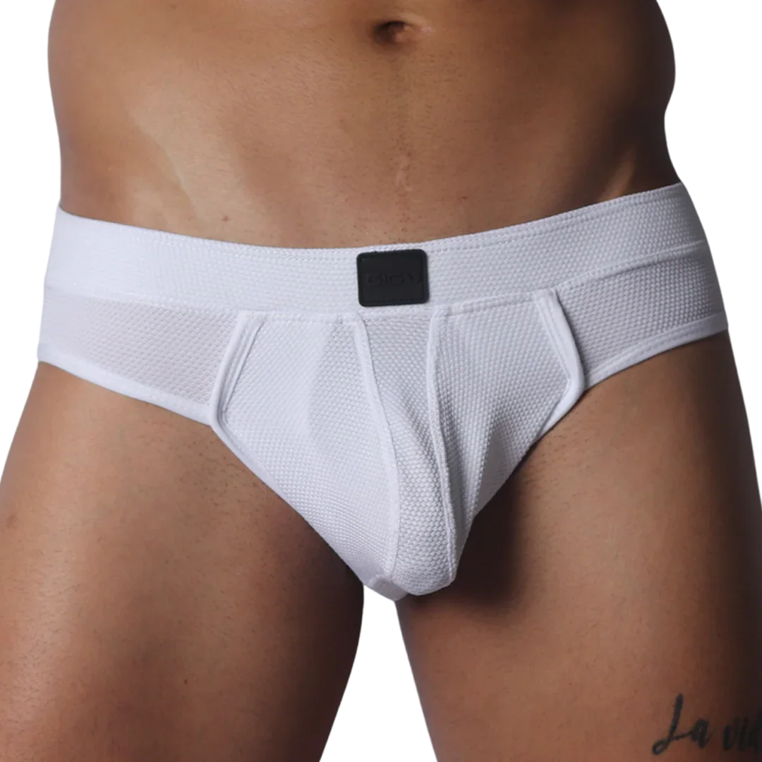 White mesh jockstrap with a textured finish, thick waistband, and a centered black Gigo logo patch.