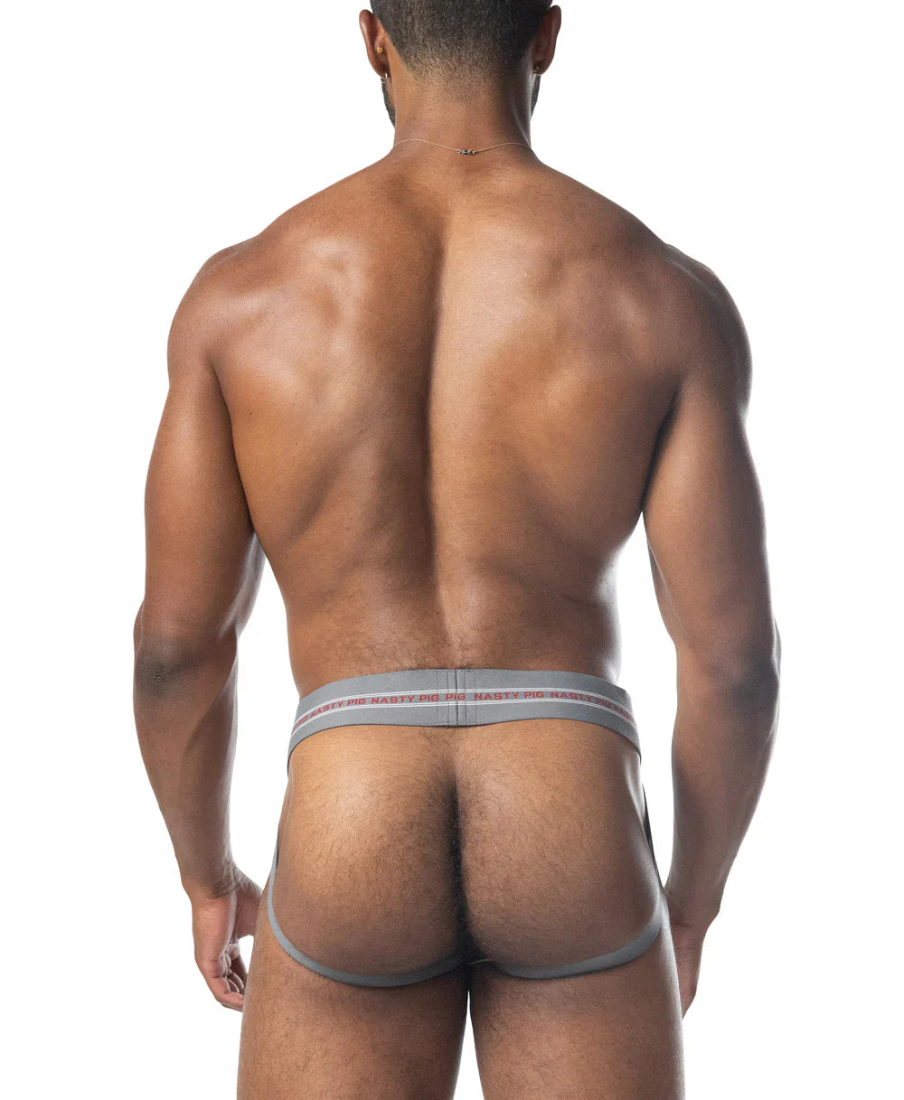 Gray core jockstrap 3.0 briefs with a subtle red and white striped waistband for athletic support