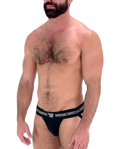 Black core jockstrap briefs with a white logo waistband featuring a nasty pig brand design