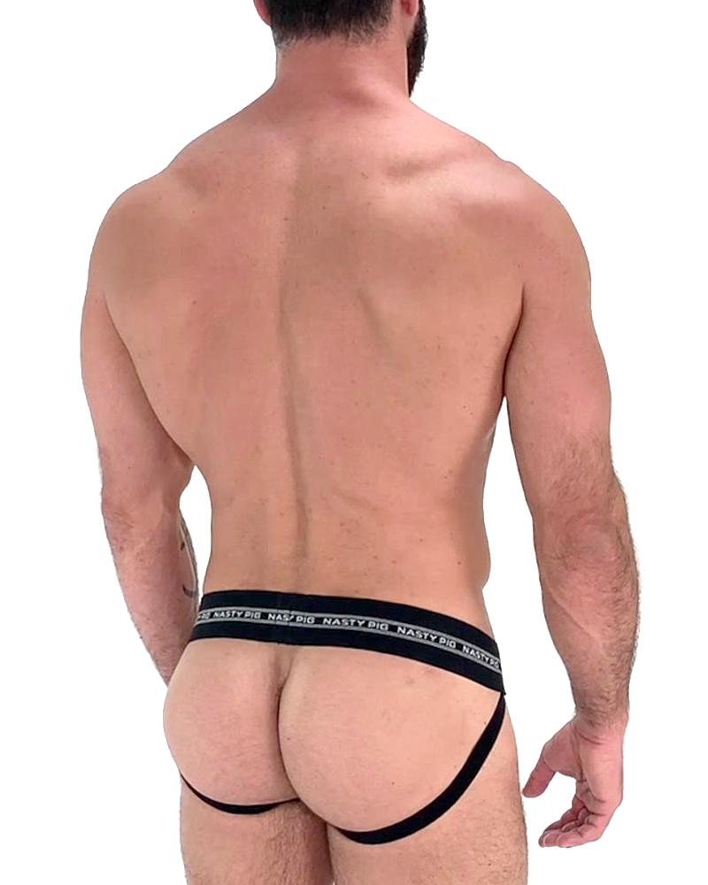 Black nasty pig core jockstrap briefs with wide elastic waistband and thin leg straps showing the back side