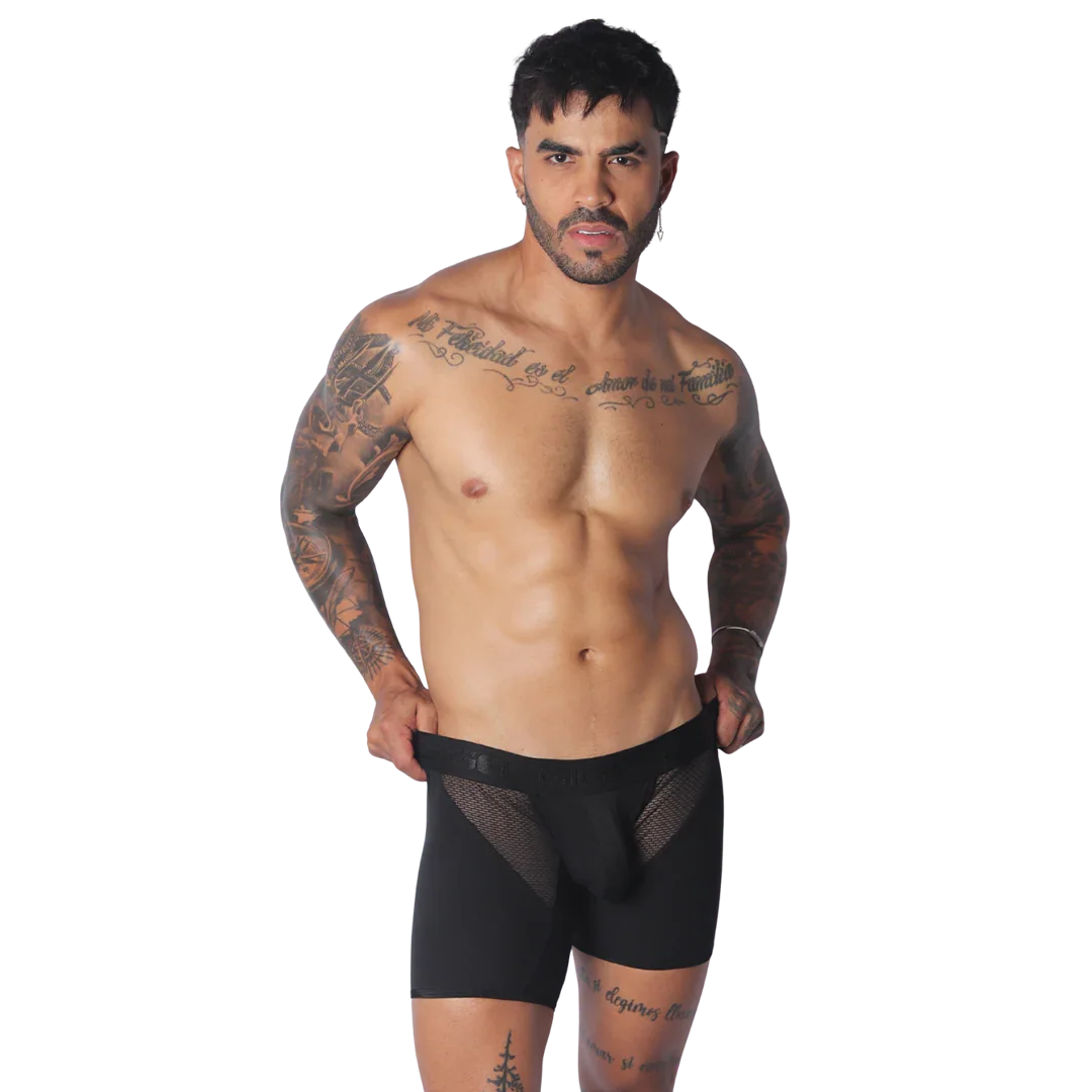 Black trunk underwear featuring a solid fabric body with sheer mesh side panels and a wide elastic waistband.