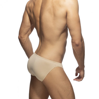 Beige cotton bikini brief with a smooth seamless design and form-fitting fit for comfortable everyday wear