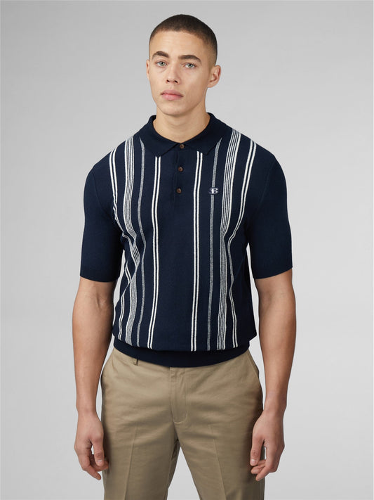 Navy blue crinkle cotton short-sleeved polo shirt with white vertical stripes and small chest embroidered logo