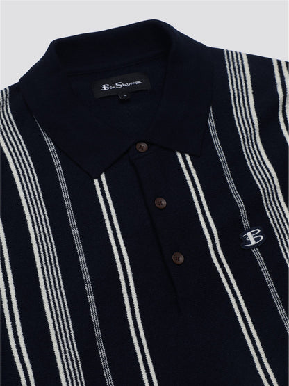 Navy blue and white striped crinkle cotton polo shirt with a small embroidered logo on the chest