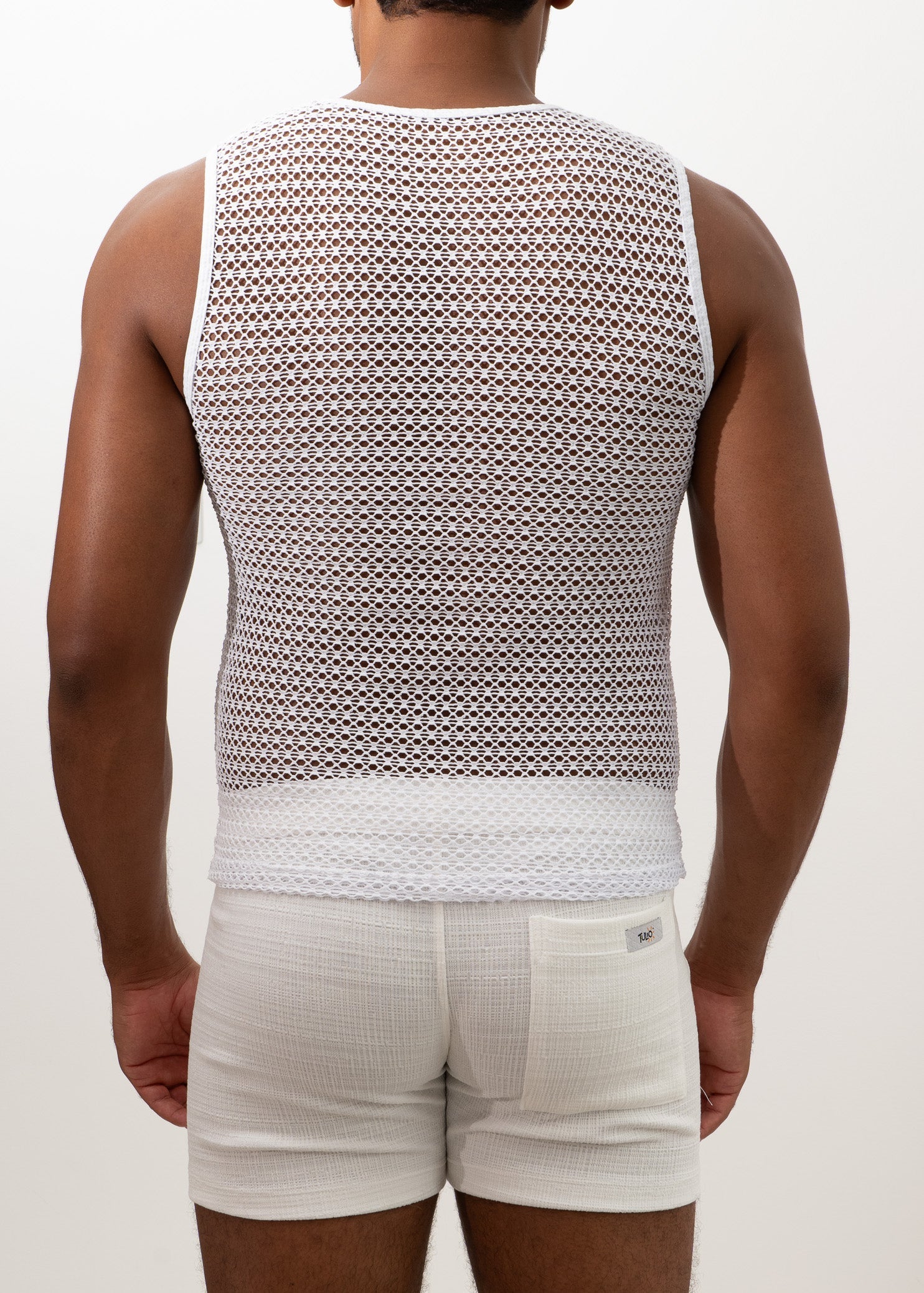White crochet mesh muscle tank top with a solid white band at the bottom for casual summer wear