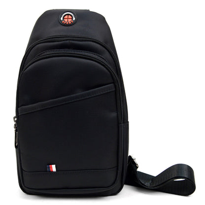 Black nylon crossbody sling bag with red and white circular logo and small flag emblem for everyday use